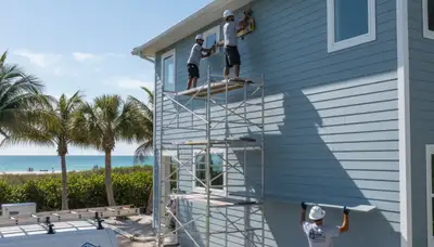 Professional vinyl siding installation on home exterior in Tampa, FL